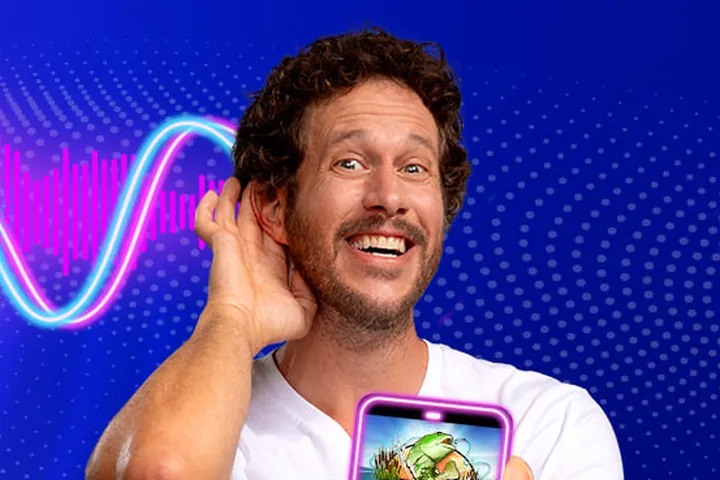 Smiling PlayOJO player holding a phone, from the brand's Canadian banner