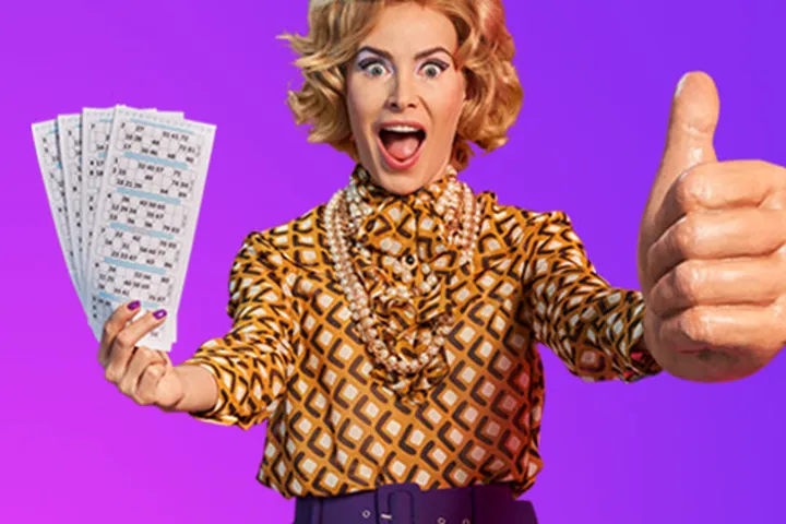 PlayOJO host with bingo tickets giving a thumbs-up, from a brand banner